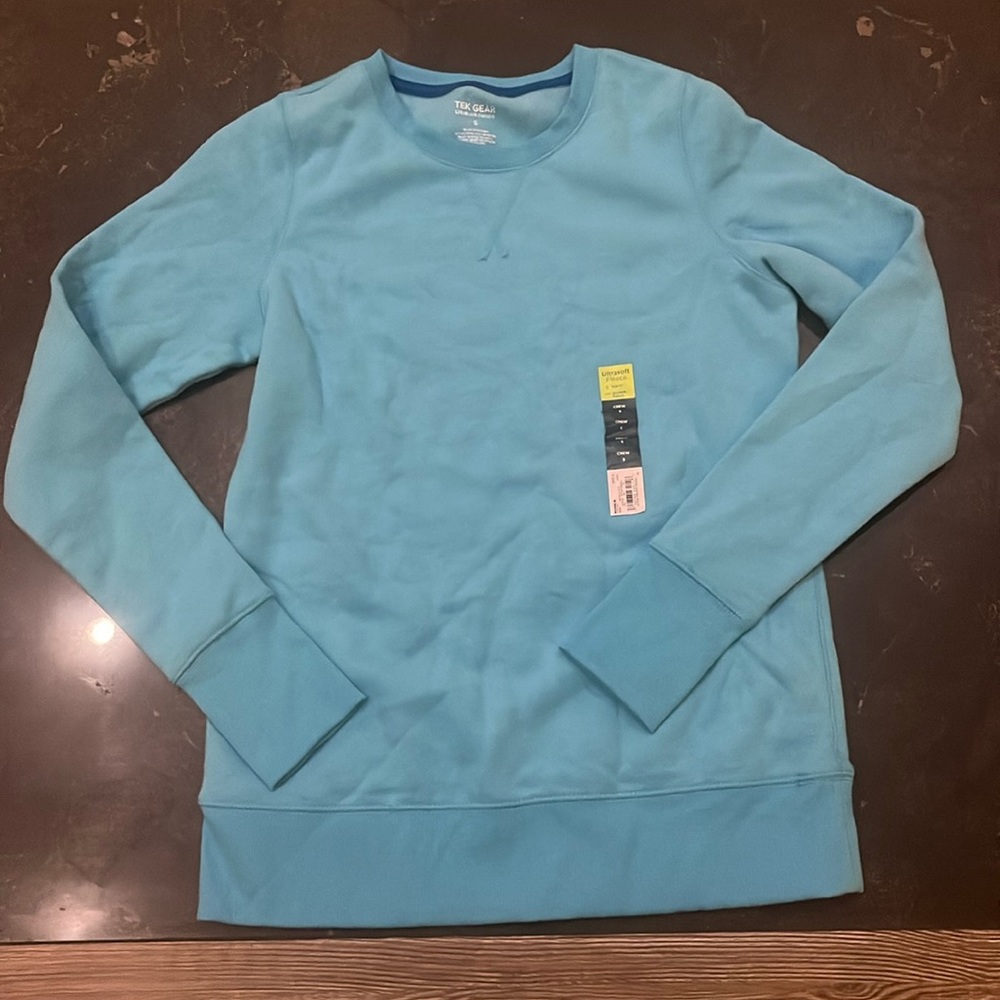 light blue crew neck! never worn!